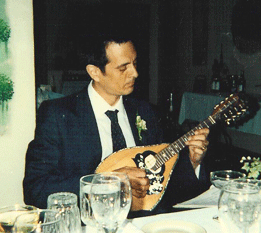 David on mandolin at a family function.